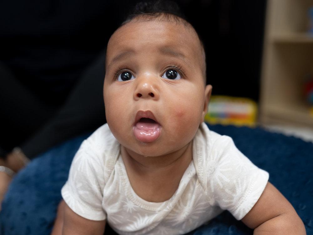 Baby doing tummy time in Victory Academy's Raleigh infant daycare classroom